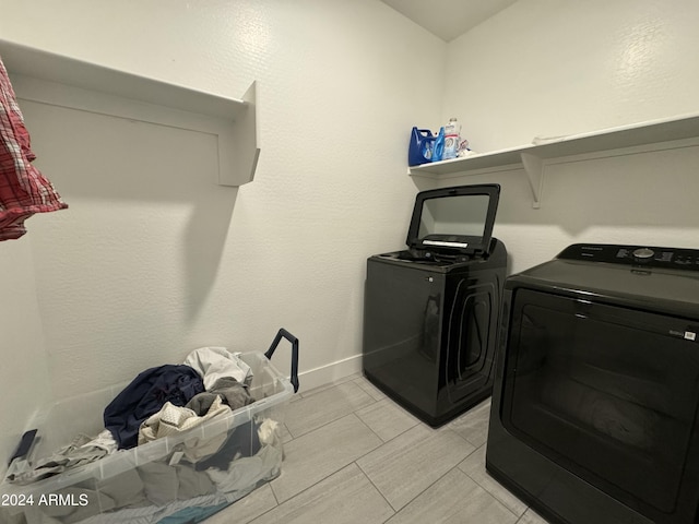 laundry room featuring washer and dryer