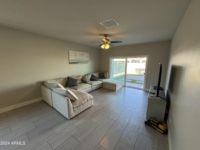 living room featuring ceiling fan