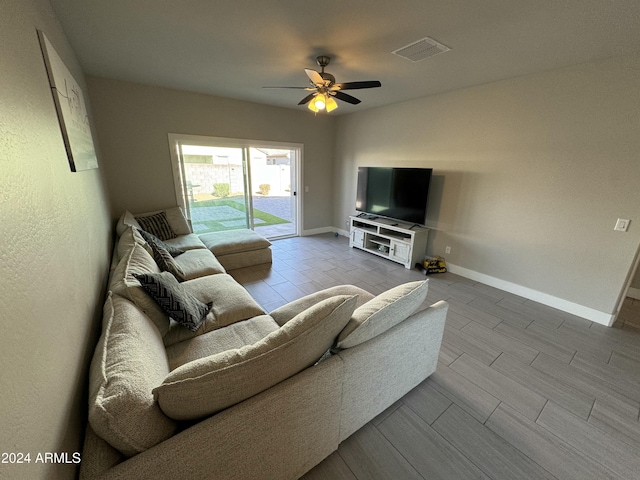 living room with ceiling fan