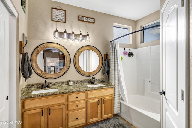 bathroom with vanity and shower / bathtub combination with curtain