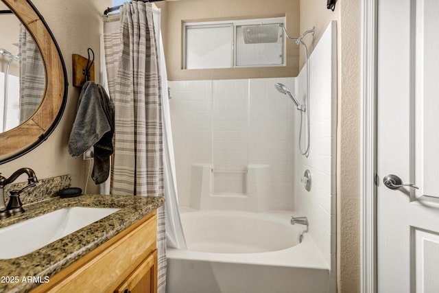 bathroom featuring shower / tub combo with curtain and vanity