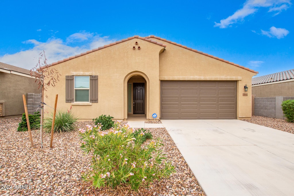 view of front of home with a garage