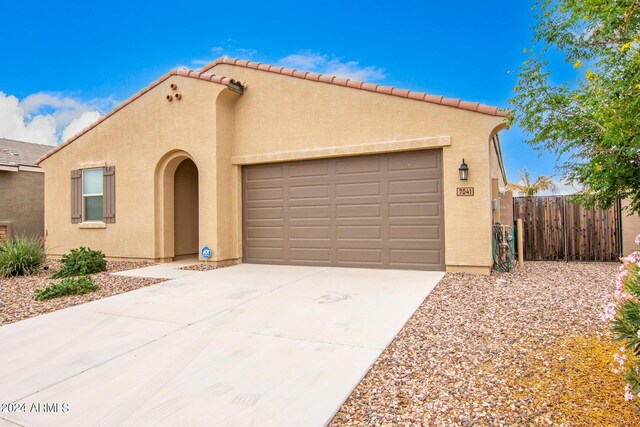 view of front of home with a garage