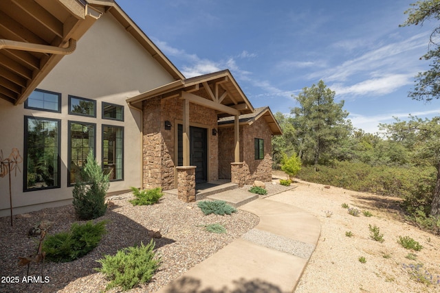 1002 W Rock Springs Cir, Payson, AZ 85541 - doorway to property with stucco siding and stone siding