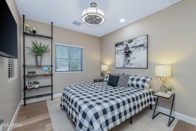 1002 W Rock Springs Cir, Payson, AZ 85541 - bedroom featuring wood finished floors, baseboards, and recessed lighting
