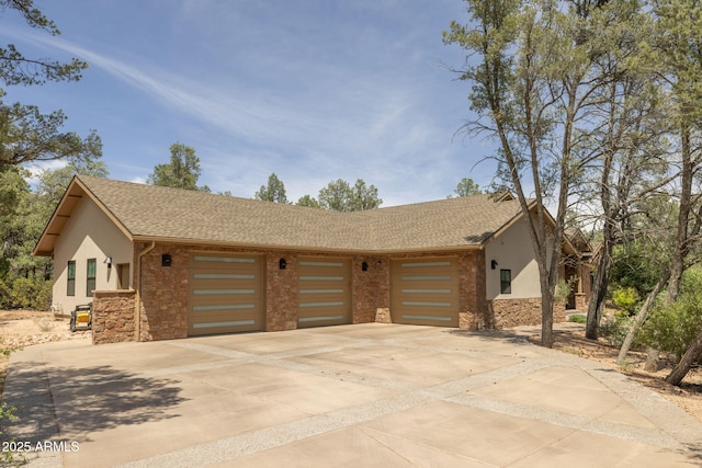 1002 W Rock Springs Cir, Payson, AZ 85541 - view of front of home featuring stucco siding, stone siding, an attached garage, concrete driveway, and a shingled roof