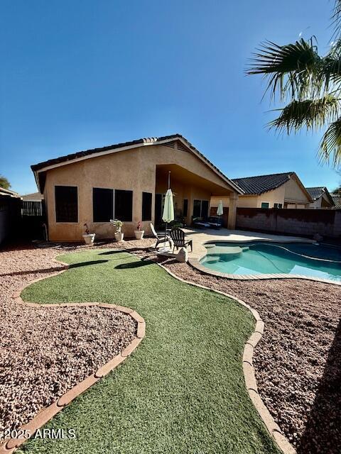 view of pool with a fenced in pool, a patio, and a fenced backyard