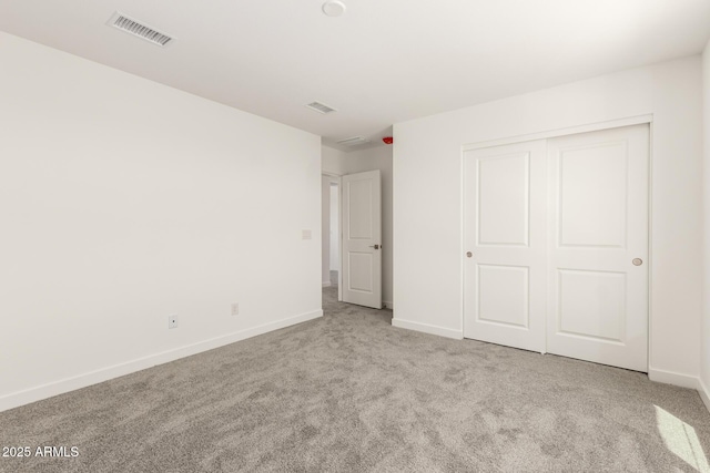 18189 W Hess St, Goodyear, AZ 85338 - unfurnished bedroom with carpet, baseboards, and a closet