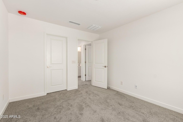 18189 W Hess St, Goodyear, AZ 85338 - unfurnished bedroom featuring carpet and baseboards