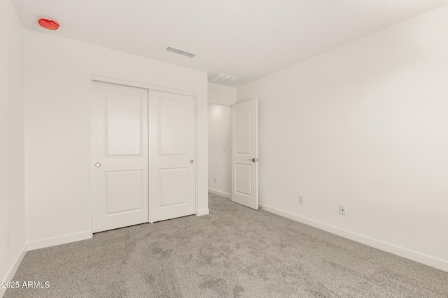 18189 W Hess St, Goodyear, AZ 85338 - unfurnished bedroom featuring carpet flooring, baseboards, and a closet