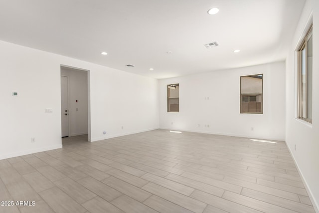 18189 W Hess St, Goodyear, AZ 85338 - empty room with recessed lighting, baseboards, and light wood-type flooring
