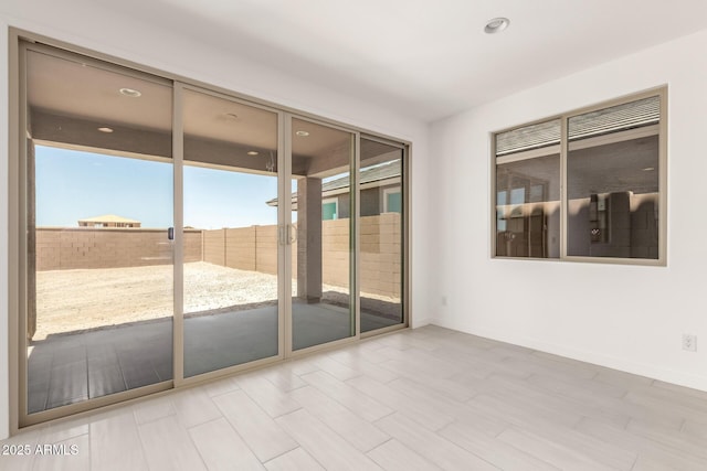 18189 W Hess St, Goodyear, AZ 85338 - empty room with recessed lighting and baseboards