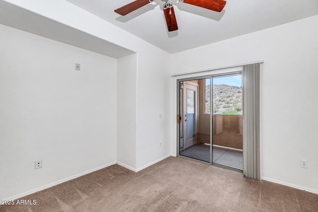 9820 N Central Ave Unit 303, Phoenix, AZ 85020 - unfurnished room featuring carpet, ceiling fan, and baseboards