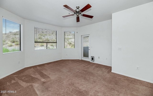 9820 N Central Ave Unit 303, Phoenix, AZ 85020 - carpeted spare room featuring ceiling fan and baseboards