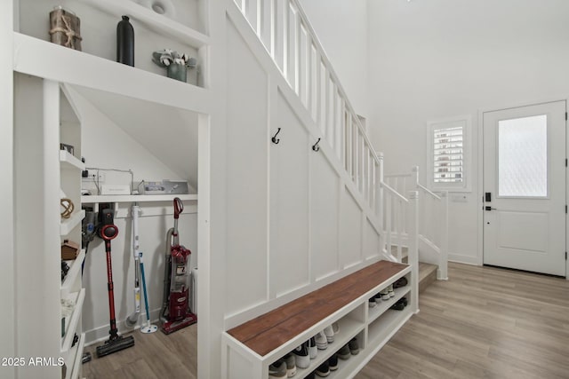 mudroom with light hardwood / wood-style flooring