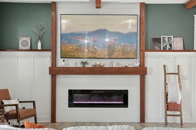 interior details with a fireplace and wood-type flooring