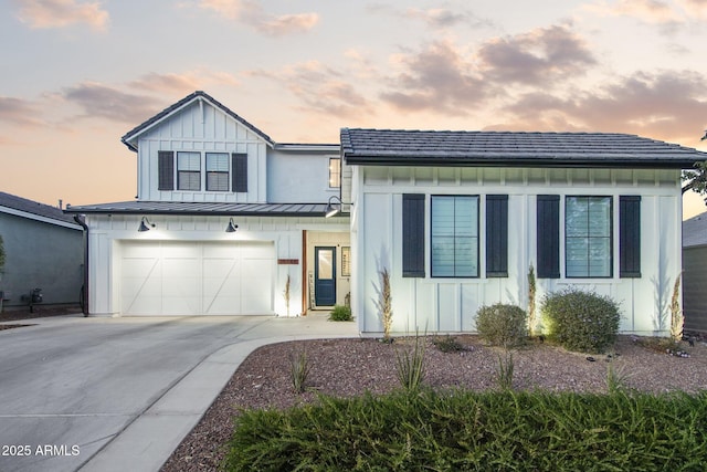 view of front of home with a garage