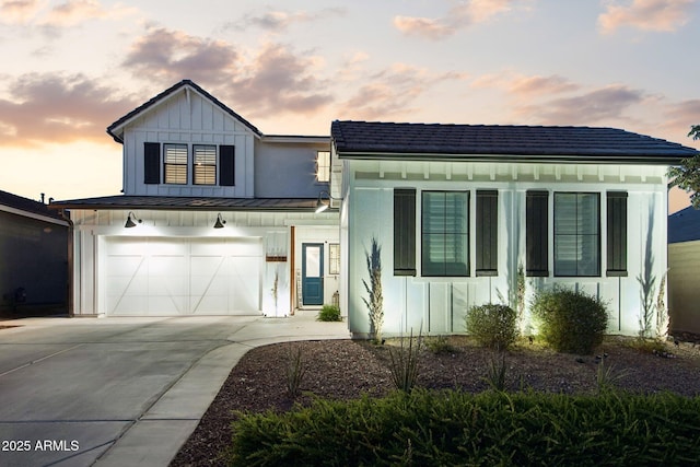 view of front of property with a garage