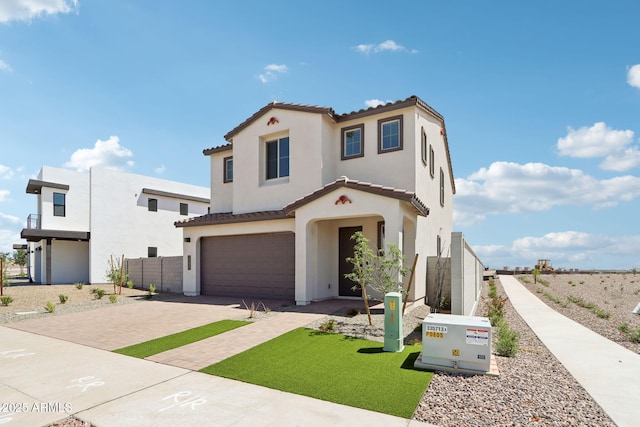 10241 E Ursula Ave, Mesa, AZ 85212 - mediterranean / spanish-style home with stucco siding, an attached garage, decorative driveway, and a tiled roof