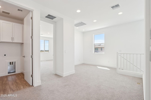 10241 E Ursula Ave, Mesa, AZ 85212 - spare room featuring healthy amount of natural light, light colored carpet, baseboards, and recessed lighting