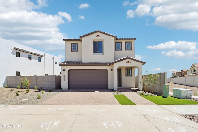 10241 E Ursula Ave, Mesa, AZ 85212 - mediterranean / spanish home featuring a tile roof, stucco siding, decorative driveway, and an attached garage