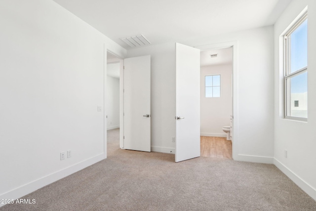 10241 E Ursula Ave, Mesa, AZ 85212 - unfurnished bedroom featuring carpet floors and baseboards