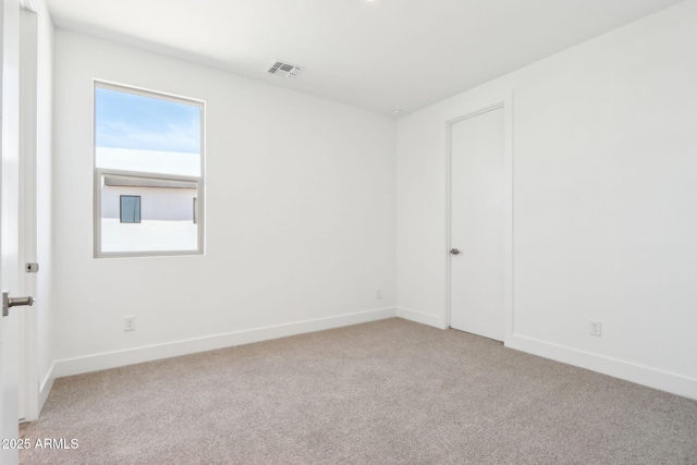 10241 E Ursula Ave, Mesa, AZ 85212 - carpeted spare room featuring baseboards