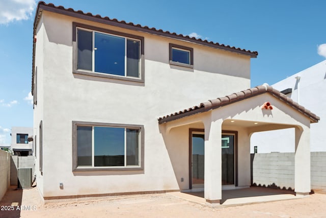 10241 E Ursula Ave, Mesa, AZ 85212 - back of house with a patio area, stucco siding, central AC unit, and a tiled roof