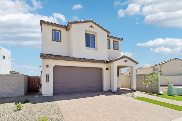 10241 E Ursula Ave, Mesa, AZ 85212 - mediterranean / spanish-style house featuring a tile roof, a garage, stucco siding, and decorative driveway