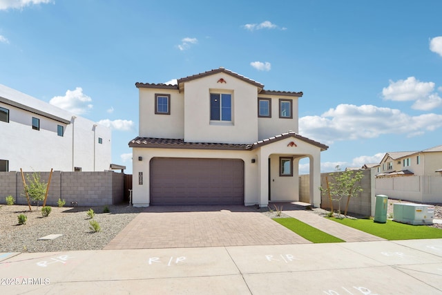 10241 E Ursula Ave, Mesa, AZ 85212 - mediterranean / spanish-style house with a tile roof, stucco siding, an attached garage, and decorative driveway
