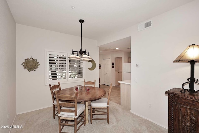 view of carpeted dining room