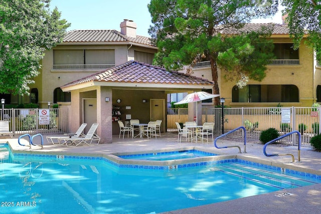 view of pool with a gazebo, a hot tub, and a patio