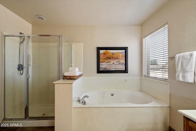 3658 E Pony Track Ln, San Tan Valley, AZ 85140 - bathroom with plenty of natural light, vanity, a stall shower, and a garden tub
