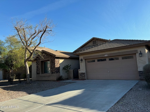 view of front of property featuring a garage