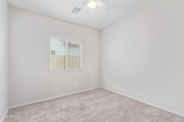 5590 W Victory Way, Florence, AZ 85132 - carpeted empty room featuring ceiling fan and baseboards