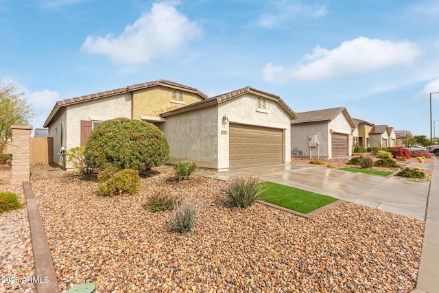 5590 W Victory Way, Florence, AZ 85132 - ranch-style home with stucco siding, a garage, and driveway