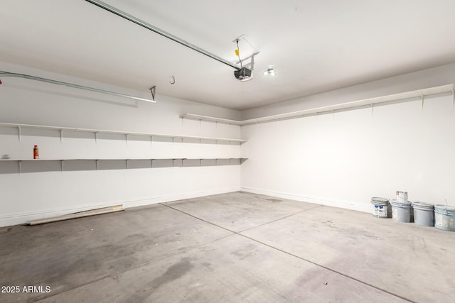 21182 E Stonecrest Dr, Queen Creek, AZ 85142 - garage with a garage door opener and baseboards