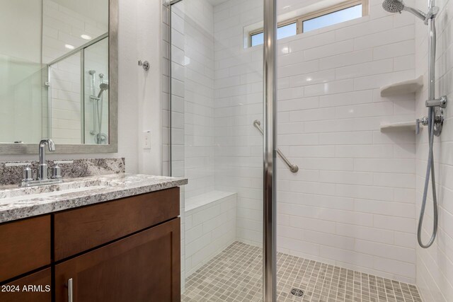 bathroom featuring vanity and walk in shower