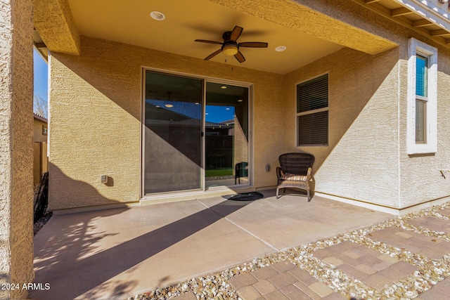 view of patio / terrace featuring ceiling fan