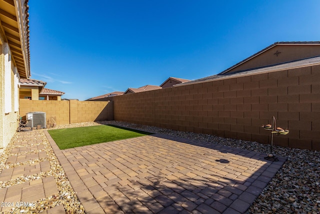 view of patio featuring central AC