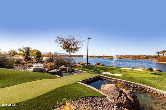 view of home's community featuring a water view