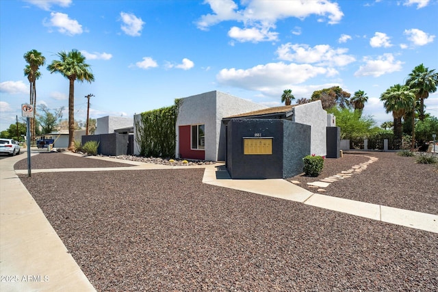 3551 N 12th St Unit 101, Phoenix, AZ 85014 - contemporary home featuring stucco siding