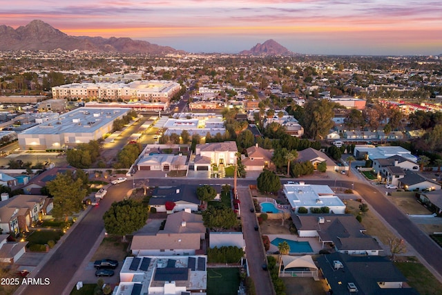 aerial view at dusk with a mountain view