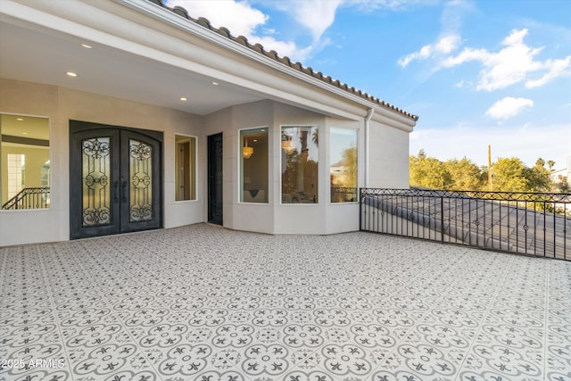 exterior space with a patio area and french doors