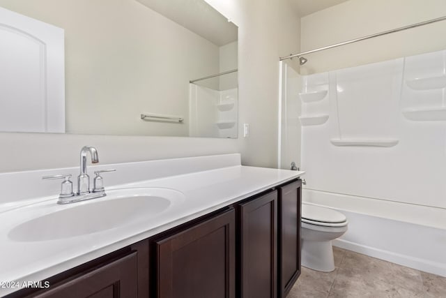 full bathroom featuring shower / tub combination, vanity, and toilet