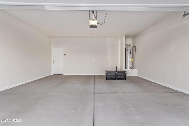 garage with electric water heater and a garage door opener