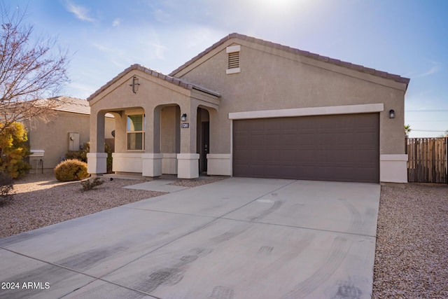 view of front of home with a garage