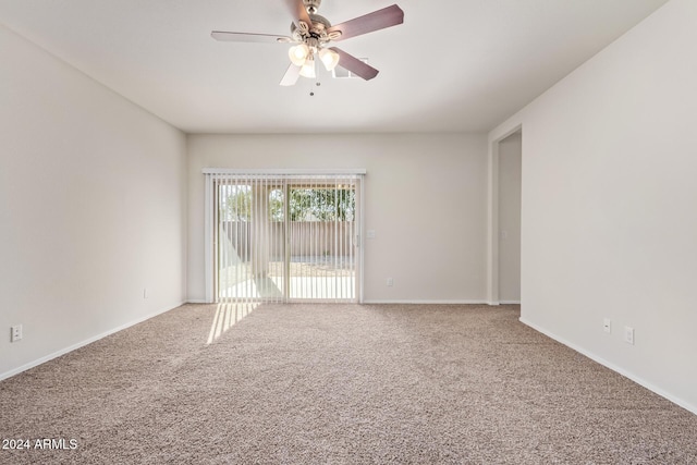 empty room with carpet flooring and ceiling fan