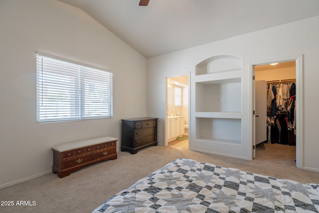 1956 N Hubbard Ln, Casa Grande, AZ 85122 - bedroom with light colored carpet, a closet, a spacious closet, and vaulted ceiling