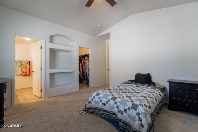 1956 N Hubbard Ln, Casa Grande, AZ 85122 - bedroom featuring a closet, lofted ceiling, a walk in closet, connected bathroom, and carpet